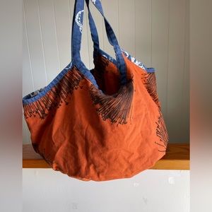 Kealopiko large cotton handmade beach bag. Orange lehua print with blue trim